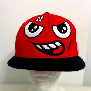 Red cap with face